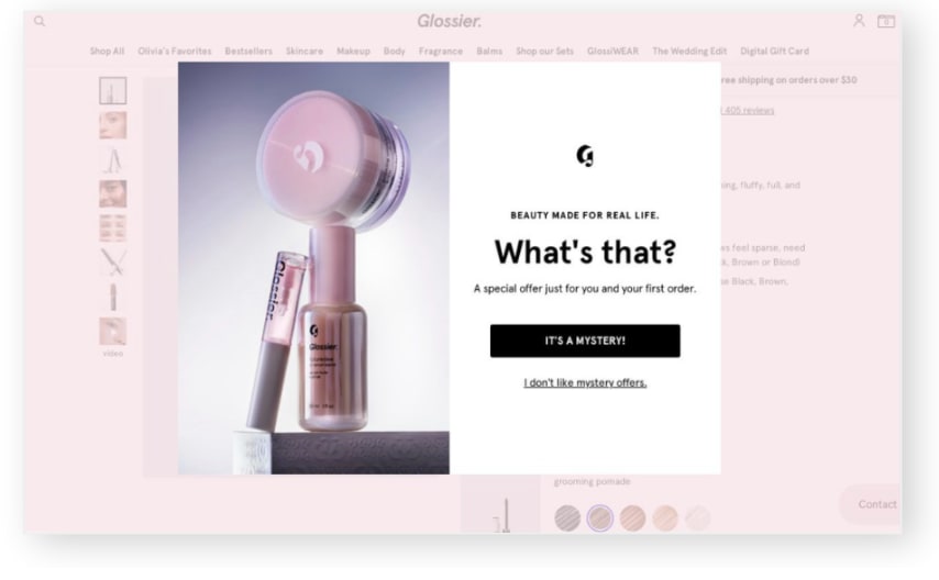 Glossier popup headed What's that, offering a special mystery offer on a first order with an It's a mystery button